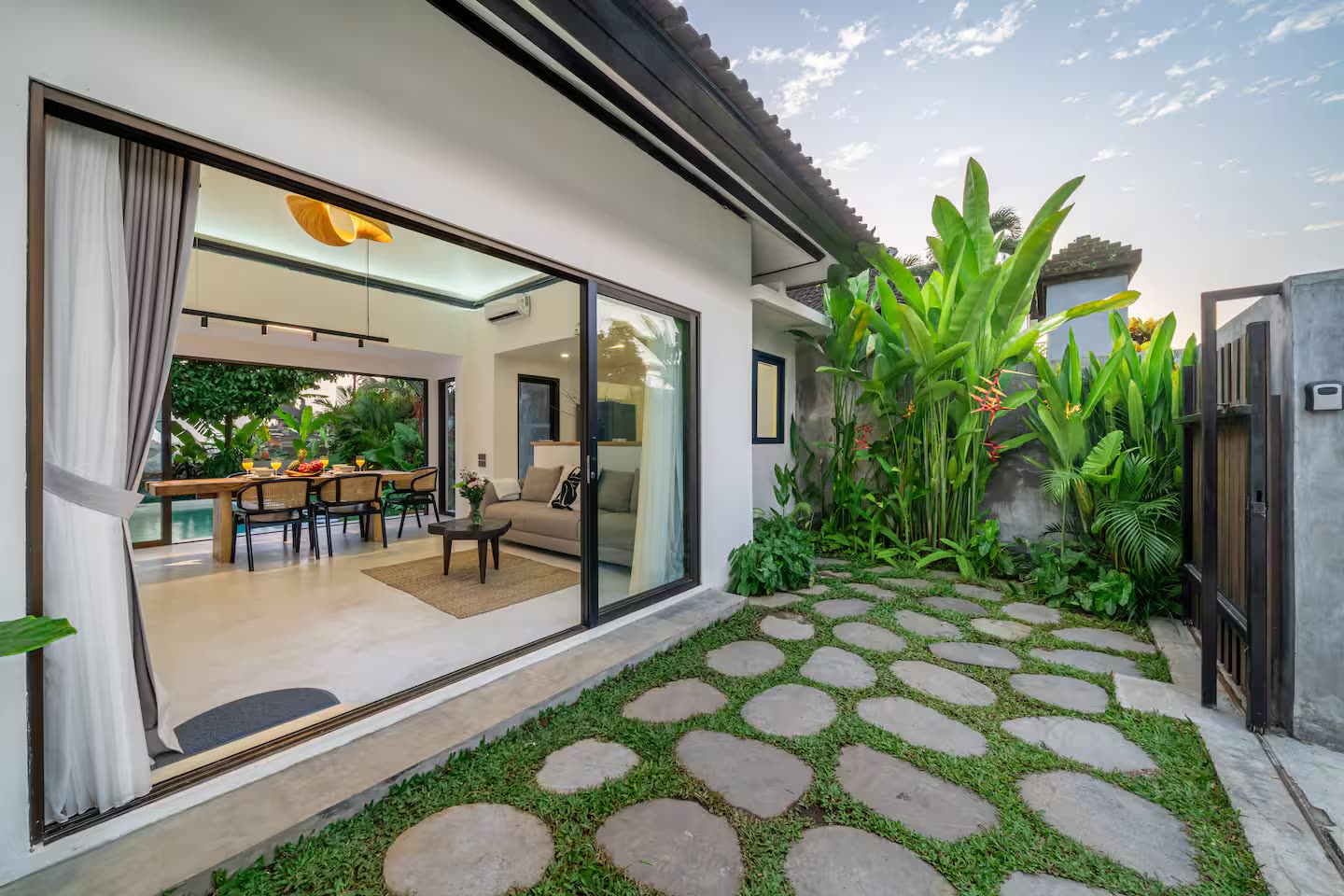 Indoor-outdoor living area with garden view